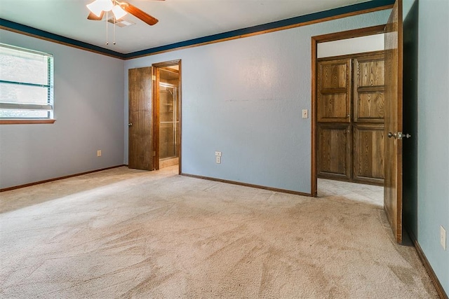 10201 Mantle Ct, Oklahoma City, OK 73162 - unfurnished bedroom with light colored carpet, crown molding, ensuite bath, and ceiling fan