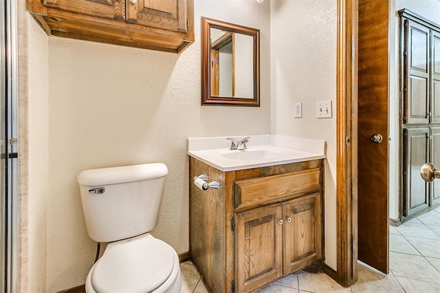 10201 Mantle Ct, Oklahoma City, OK 73162 - bathroom featuring vanity, a textured wall, and tile patterned floors