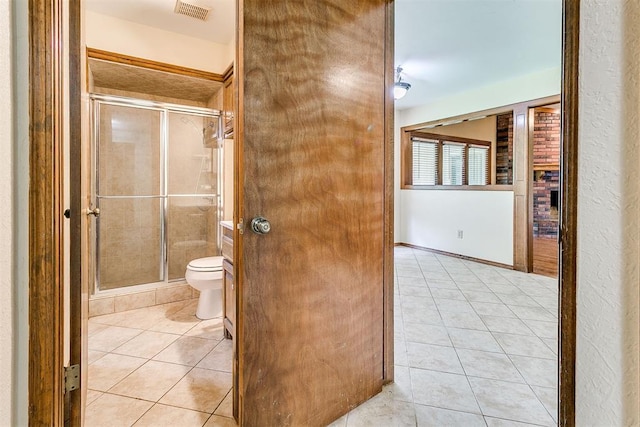 10201 Mantle Ct, Oklahoma City, OK 73162 - bathroom with tile patterned flooring and a shower stall