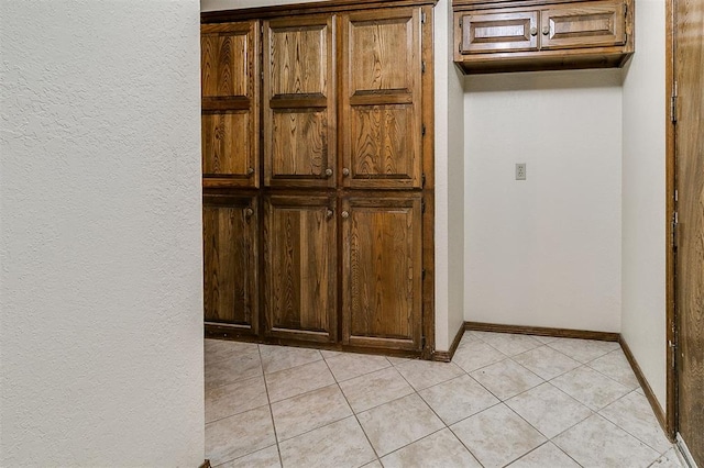 10201 Mantle Ct, Oklahoma City, OK 73162 - detailed view of baseboards and a textured wall