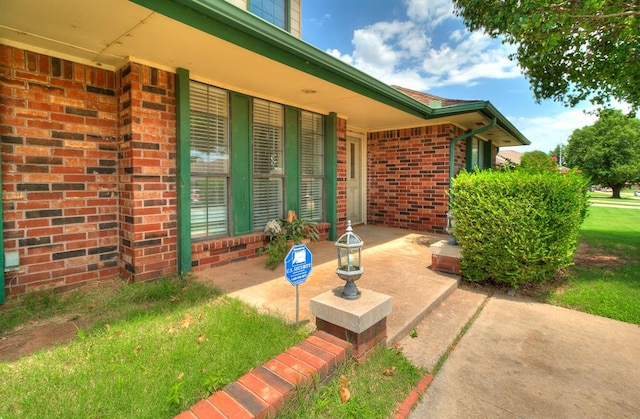 10201 Mantle Ct, Oklahoma City, OK 73162 - property entrance with brick siding
