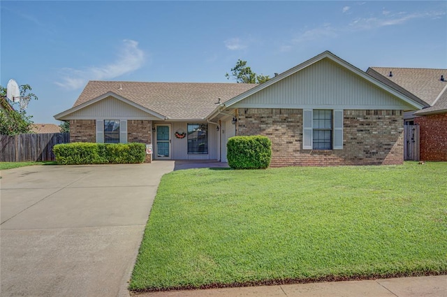 2109 Shamrock Dr, Edmond, OK 73003 - single story home with brick siding, roof with shingles, and driveway