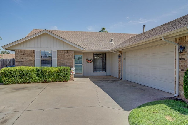 2109 Shamrock Dr, Edmond, OK 73003 - single story home with a shingled roof, driveway, and an attached garage