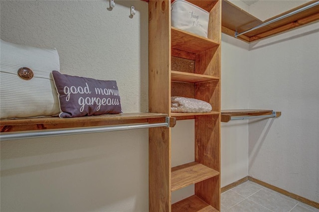 2109 Shamrock Dr, Edmond, OK 73003 - spacious closet with tile patterned flooring
