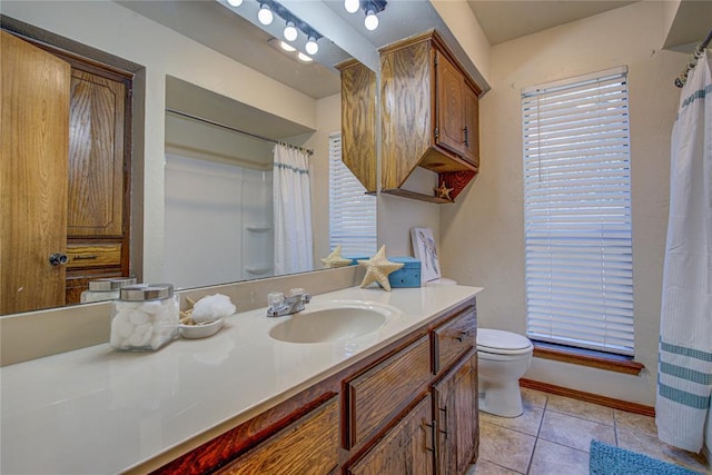 2109 Shamrock Dr, Edmond, OK 73003 - bathroom with vanity and tile patterned flooring