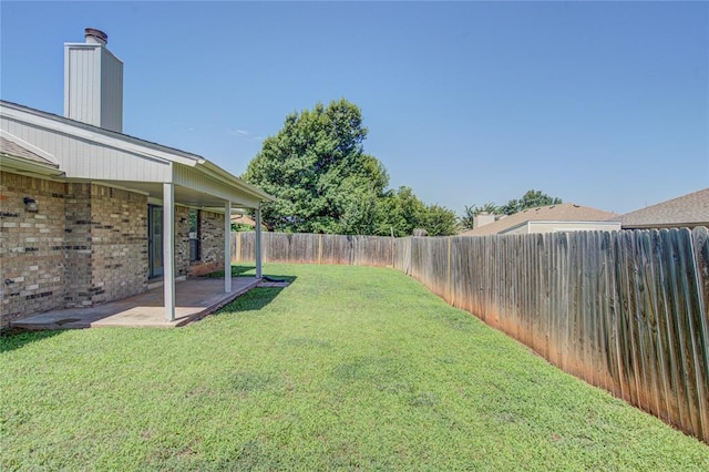 2109 Shamrock Dr, Edmond, OK 73003 - fenced backyard with a patio