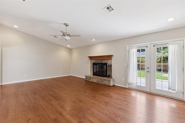 3000 Middlesex Dr, Oklahoma City, OK 73120 - unfurnished living room featuring ceiling fan, french doors, wood finished floors, a fireplace, and recessed lighting