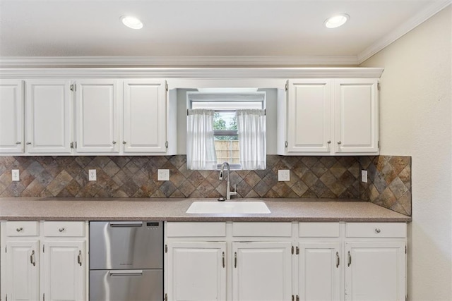 3000 Middlesex Dr, Oklahoma City, OK 73120 - kitchen featuring white cabinets, dishwasher, tasteful backsplash, crown molding, and light countertops
