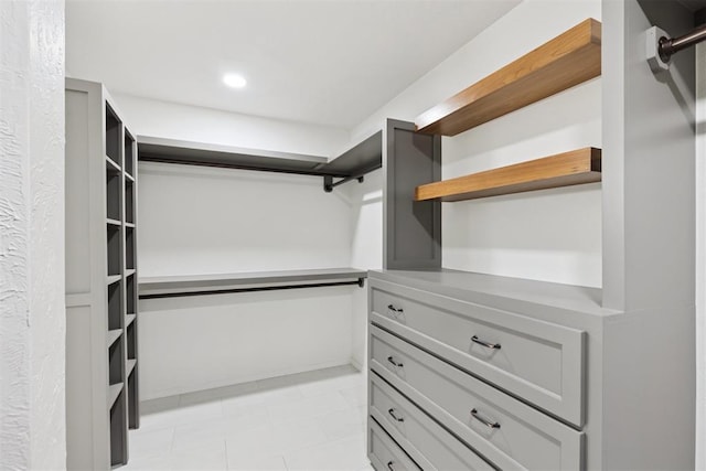 3000 Middlesex Dr, Oklahoma City, OK 73120 - walk in closet with light tile patterned flooring