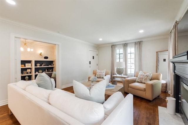1005 NW 40th St, Oklahoma City, OK 73118 - living room with wood finished floors, recessed lighting, ornamental molding, and a chandelier