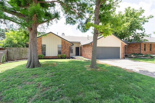 2322 Ripple Creek Ln, Edmond, OK 73012 - view of front of house with a garage, concrete driveway, brick siding, board and batten siding, and a chimney