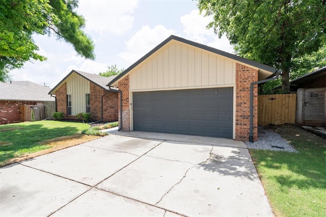 2322 Ripple Creek Ln, Edmond, OK 73012 - view of front facade with brick siding and a garage