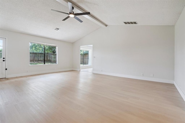 2322 Ripple Creek Ln, Edmond, OK 73012 - unfurnished room with light wood-style flooring, ceiling fan, and a textured ceiling