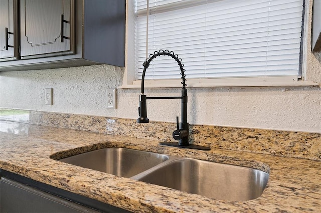 2322 Ripple Creek Ln, Edmond, OK 73012 - kitchen view of light stone countertops and gray cabinets