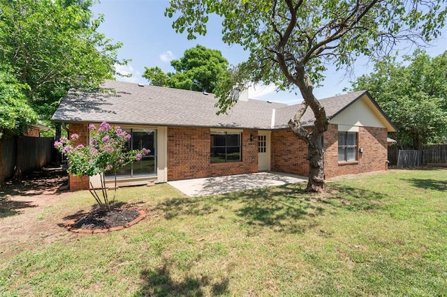 2322 Ripple Creek Ln, Edmond, OK 73012 - rear view of house featuring a patio, brick siding, and a chimney