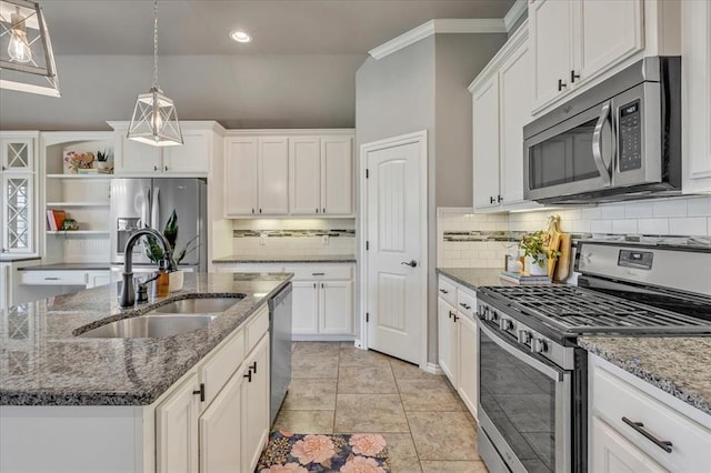18608 Summer Grove Ave, Edmond, OK 73012 - kitchen with stainless steel appliances, white cabinets, tasteful backsplash, a kitchen island with sink, and open shelves