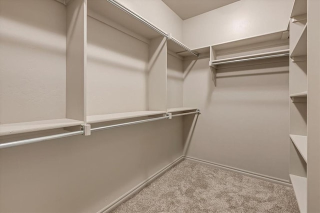 18608 Summer Grove Ave, Edmond, OK 73012 - walk in closet featuring carpet floors