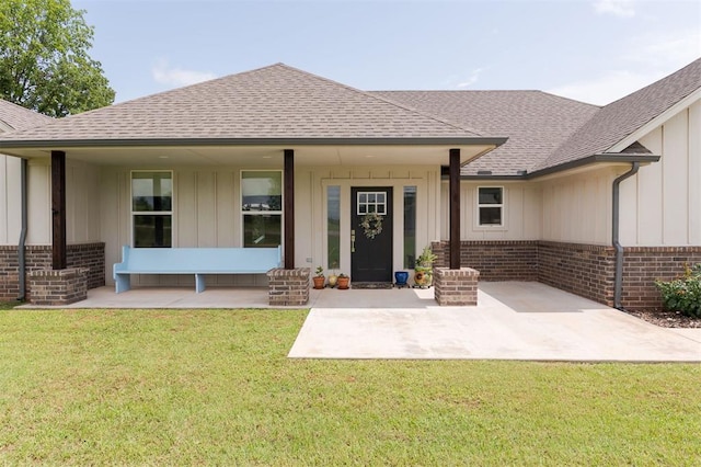 337030 E 1016th Rd, Meeker, OK 74855 - doorway to property with brick siding and roof with shingles