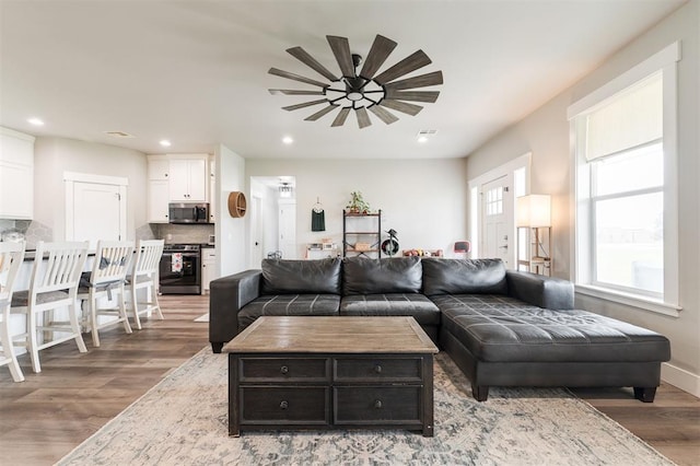 337030 E 1016th Rd, Meeker, OK 74855 - living room with ceiling fan, wood finished floors, and recessed lighting