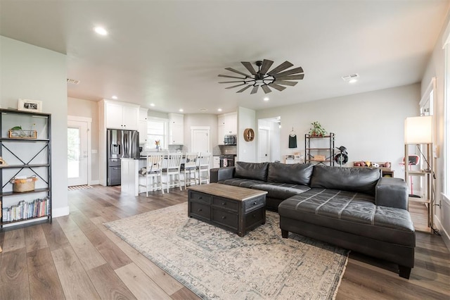 337030 E 1016th Rd, Meeker, OK 74855 - living area featuring a ceiling fan, wood finished floors, and recessed lighting