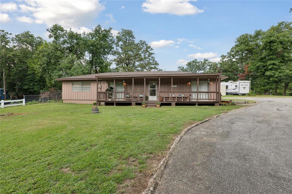 249 Sunset Cv, Mead, OK 73449 - view of front of home with board and batten siding