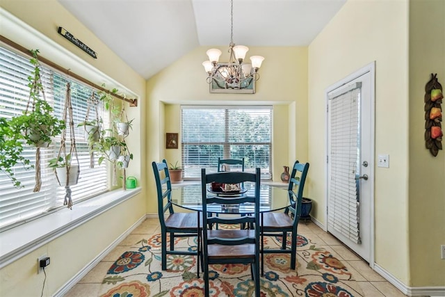 3751 Rock Dove Lndg, Edmond, OK 73034 - dining area with light tile patterned floors, a chandelier, and vaulted ceiling