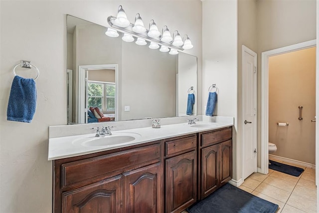 3751 Rock Dove Lndg, Edmond, OK 73034 - full bathroom featuring double vanity and tile patterned floors
