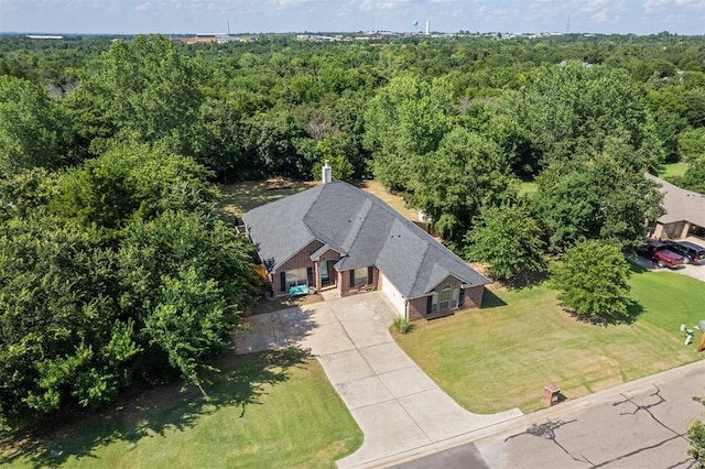 3751 Rock Dove Lndg, Edmond, OK 73034 - view from above of property with a forest