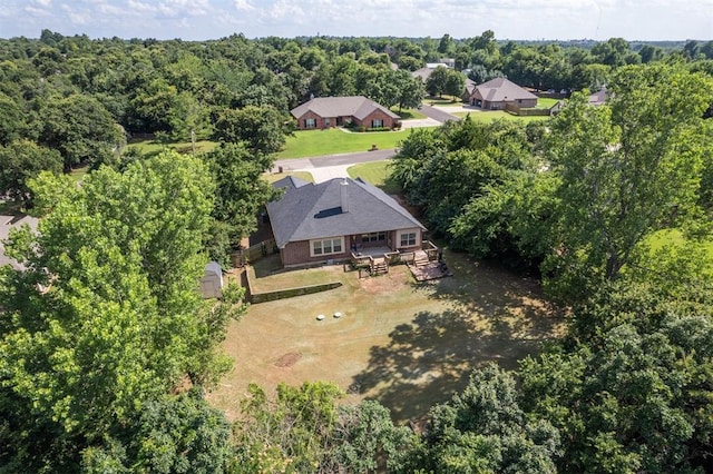 3751 Rock Dove Lndg, Edmond, OK 73034 - view of subject property featuring a forest