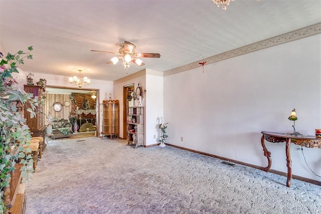 616 Kingston Dr, Yukon, OK 73099 - unfurnished living room with a chandelier, carpet, and ceiling fan