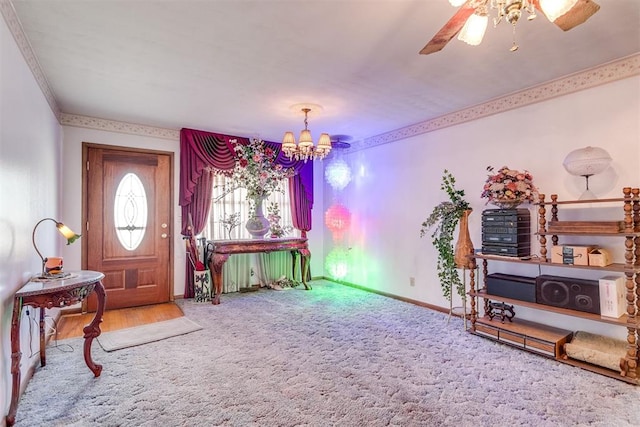 616 Kingston Dr, Yukon, OK 73099 - entryway featuring a chandelier, carpet flooring, and a ceiling fan