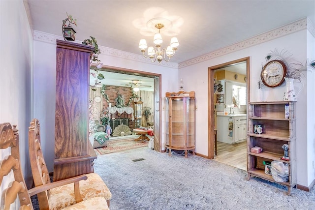 616 Kingston Dr, Yukon, OK 73099 - living area with light carpet and a chandelier
