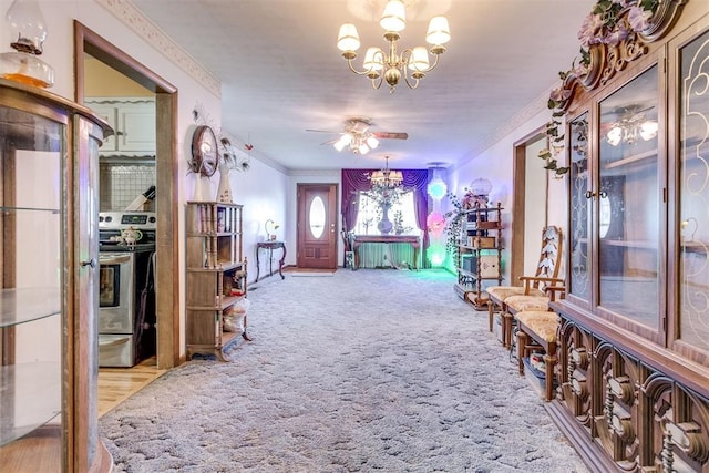 616 Kingston Dr, Yukon, OK 73099 - corridor with ornamental molding, a chandelier, and carpet floors
