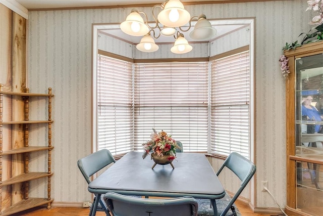 616 Kingston Dr, Yukon, OK 73099 - dining area featuring a chandelier and wood finished floors