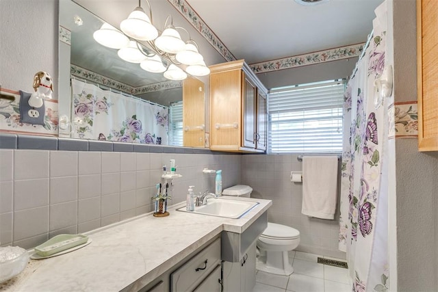 616 Kingston Dr, Yukon, OK 73099 - bathroom featuring tile walls, vanity, tile patterned flooring, and a shower with shower curtain