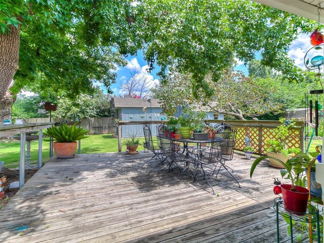 3000 Beverly Dr, Edmond, OK 73013 - wooden deck with outdoor dining area