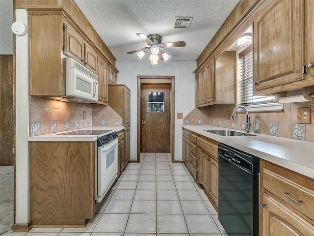 3000 Beverly Dr, Edmond, OK 73013 - kitchen featuring white appliances, light countertops, a ceiling fan, backsplash, and a textured ceiling
