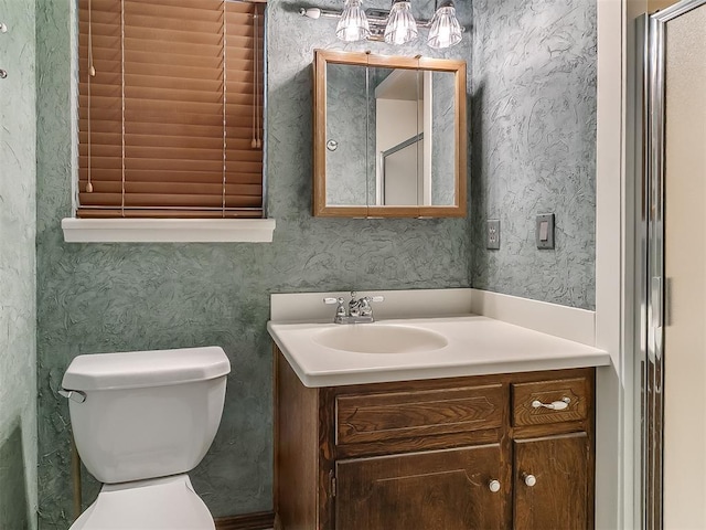3000 Beverly Dr, Edmond, OK 73013 - bathroom featuring vanity and wallpapered walls