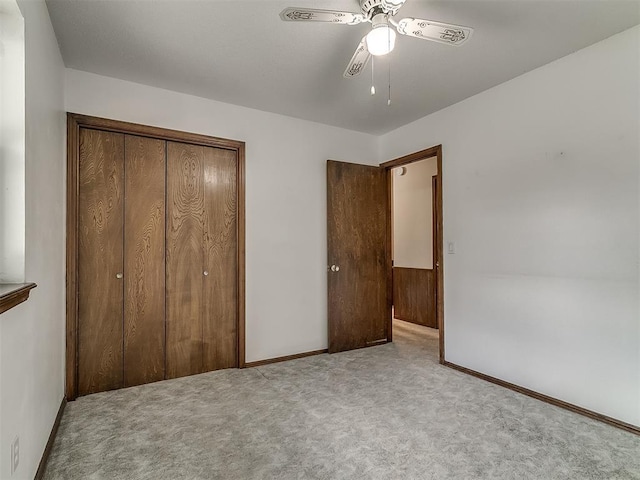 3000 Beverly Dr, Edmond, OK 73013 - unfurnished bedroom featuring a closet, carpet flooring, and a ceiling fan