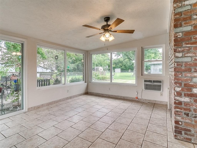 3000 Beverly Dr, Edmond, OK 73013 - unfurnished sunroom with healthy amount of natural light, a textured ceiling, tile patterned floors, and a wall mounted air conditioner