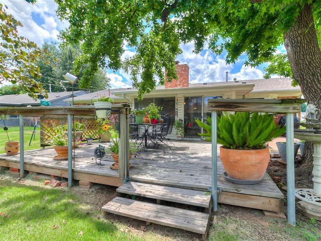 3000 Beverly Dr, Edmond, OK 73013 - deck featuring outdoor dining space and a lawn