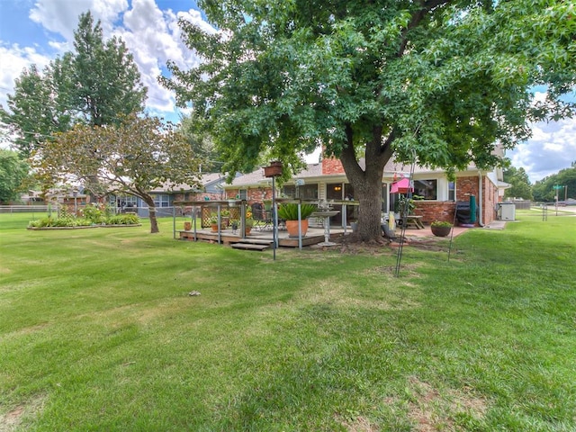 3000 Beverly Dr, Edmond, OK 73013 - view of yard featuring a deck
