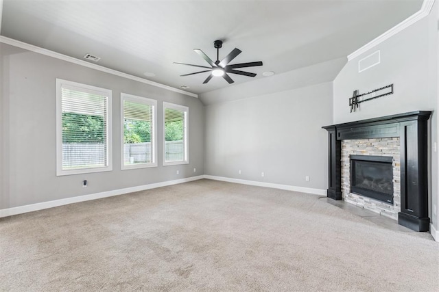 9041 NW 147th Ter, Yukon, OK 73099 - unfurnished living room featuring ceiling fan, crown molding, carpet floors, and a fireplace