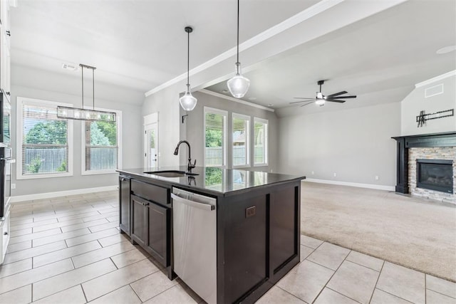9041 NW 147th Ter, Yukon, OK 73099 - kitchen with dishwasher, light carpet, dark countertops, light tile patterned floors, and ornamental molding