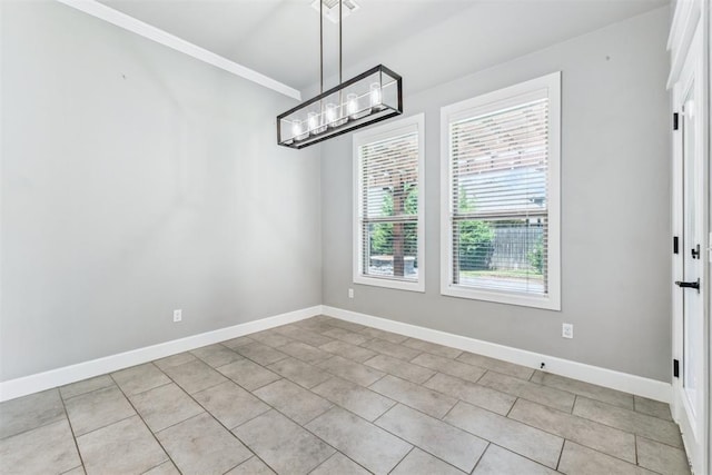 9041 NW 147th Ter, Yukon, OK 73099 - unfurnished dining area featuring light tile patterned flooring, ornamental molding, and a chandelier