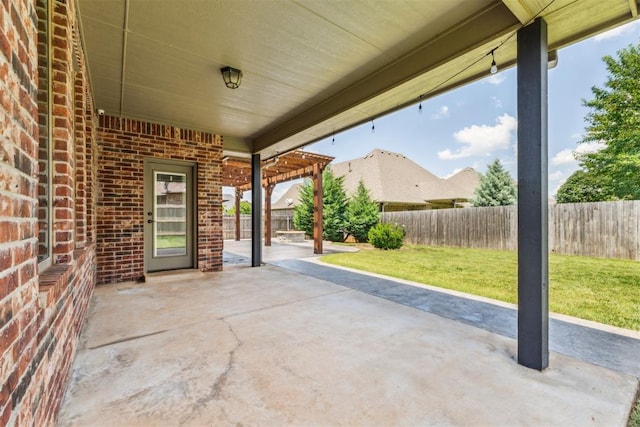 9041 NW 147th Ter, Yukon, OK 73099 - fenced backyard featuring a patio area
