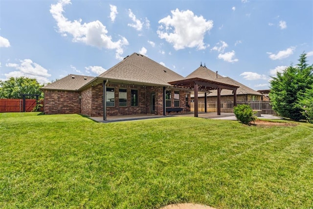 9041 NW 147th Ter, Yukon, OK 73099 - rear view of property with a patio area, a shingled roof, and brick siding