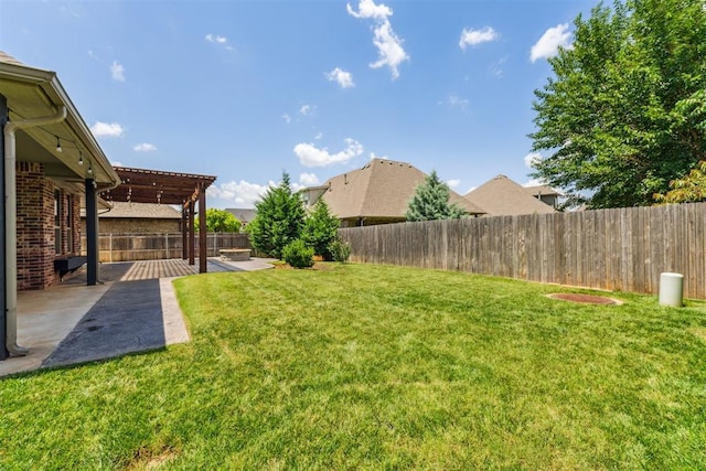 9041 NW 147th Ter, Yukon, OK 73099 - fenced backyard featuring a patio and a pergola