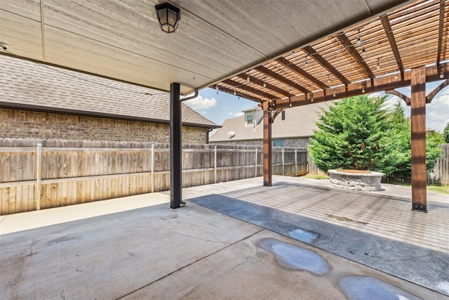 9041 NW 147th Ter, Yukon, OK 73099 - fenced backyard featuring an outdoor fire pit, a patio, and a pergola