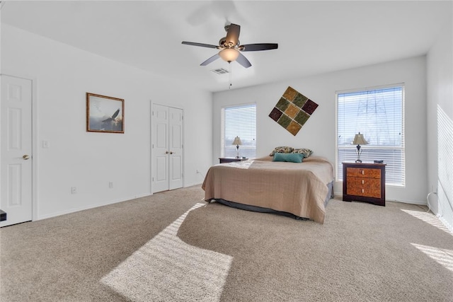1045 Belmont Pl, Yukon, OK 73099 - bedroom with carpet flooring and ceiling fan